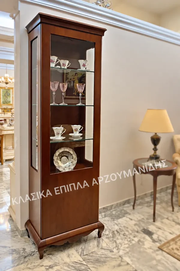 Κλασική βιτρίνα LOUI II 1F σε σκούρα απόχρωση με μία ψηλή γυάλινη πόρτα και ράφια
